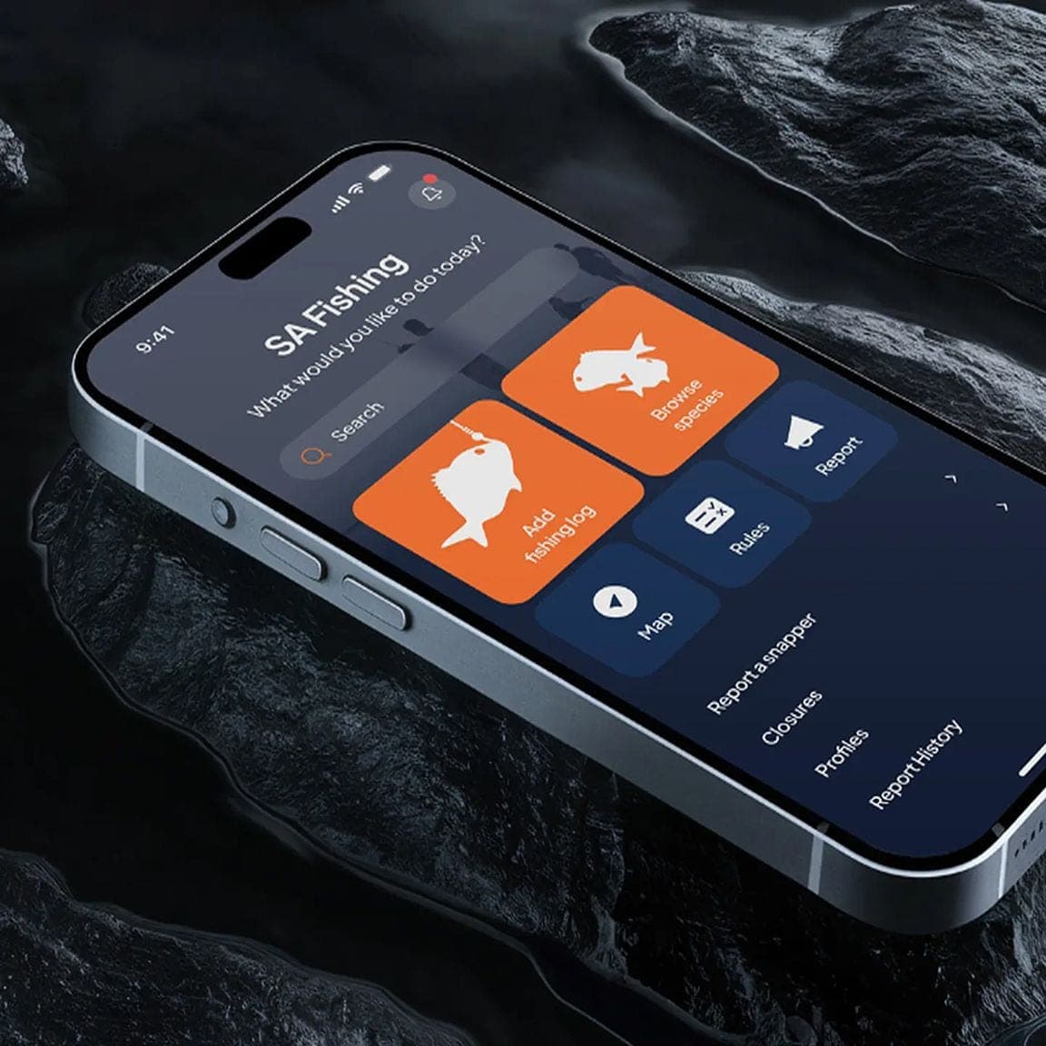 SA Fishing app home screen on a phone over dark rock, with add fishing log and browse species tiles
