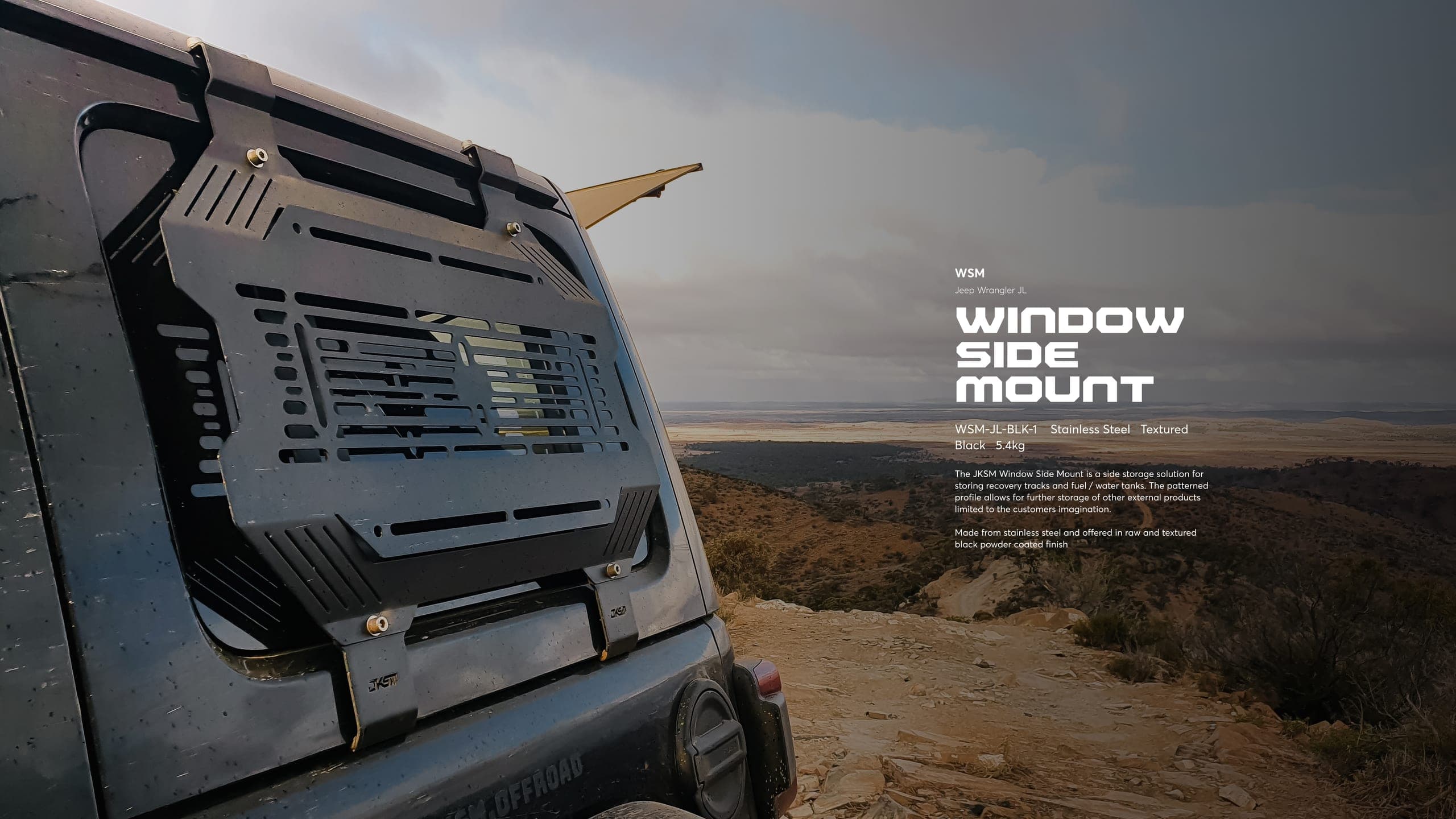Product shot of the Window Side Mount storage panel fitted to a four-wheel drive on a clifftop track