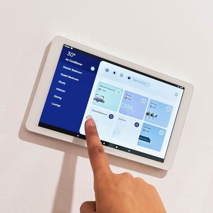 A user interacting with the Platinum Elite air conditioner controller